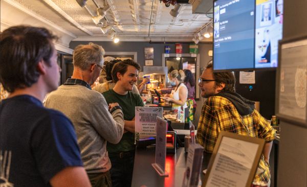 Excited moviegoers queue up for tickets and popcorn. (Photo courtesy of Juan Baena [Osito Mountain Photos]).